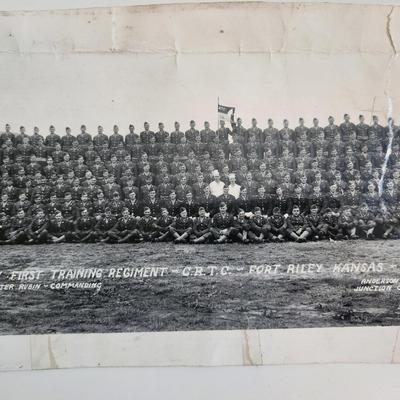 Sale Photo Thumbnail #281: This auction lot is for two WW2 Training Regiment Photographs.  This are both identical and show Troop G, First Training Regiment - CRTC - Fort Riley, KS dated May 1944.  One of photos is rolled and the other is flat.  The flat photo has cracking damaged 