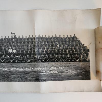 Sale Photo Thumbnail #288: This auction lot is for two WW2 Training Regiment Photographs.  This are both identical and show Troop G, First Training Regiment - CRTC - Fort Riley, KS dated May 1944.  One of photos is rolled and the other is flat.  The flat photo has cracking damaged 