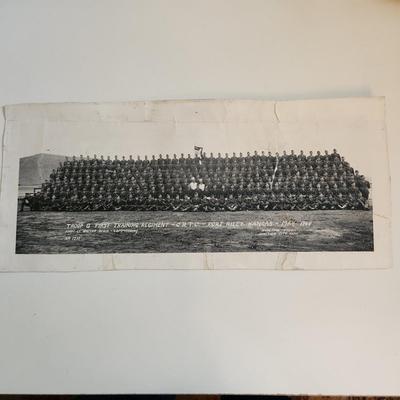 Sale Photo Thumbnail #278: This auction lot is for two WW2 Training Regiment Photographs.  This are both identical and show Troop G, First Training Regiment - CRTC - Fort Riley, KS dated May 1944.  One of photos is rolled and the other is flat.  The flat photo has cracking damaged 