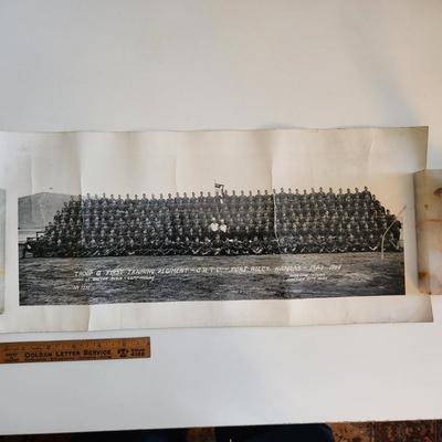 Sale Photo Thumbnail #284: This auction lot is for two WW2 Training Regiment Photographs.  This are both identical and show Troop G, First Training Regiment - CRTC - Fort Riley, KS dated May 1944.  One of photos is rolled and the other is flat.  The flat photo has cracking damaged 