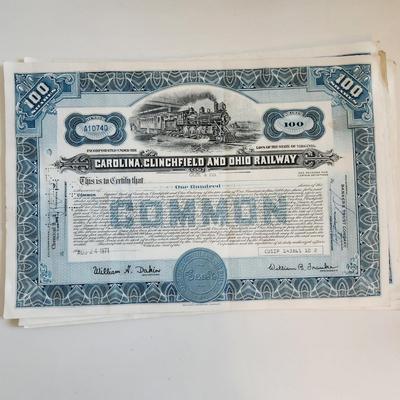 Sale Photo Thumbnail #312: This auction lot is for a gathering of eight certificates of Railroad Stock Shares.  These shares have been cashed in and hold not monetary value other than for their handsome graphics.  Many folks use this for many purposes - get yours here.