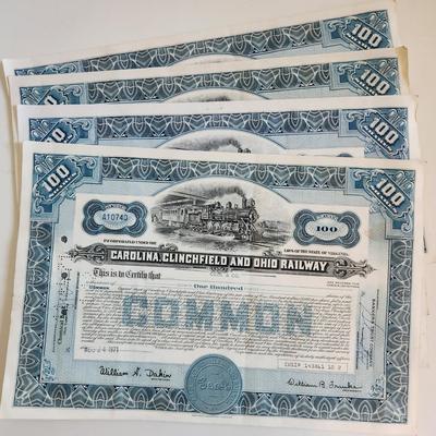Sale Photo Thumbnail #313: This auction lot is for a gathering of eight certificates of Railroad Stock Shares.  These shares have been cashed in and hold not monetary value other than for their handsome graphics.  Many folks use this for many purposes - get yours here.