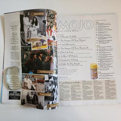 Sale Photo Thumbnail #321: This auction lot is for a copy of MOJO - 1000 Days of Revolution - The Beatles Final Years.  This magazine chronicals January 1, 1968 through September 27, 1970.  Many great photographs and articles.  This unit is number 10,300 of 95,000 as stated on the 