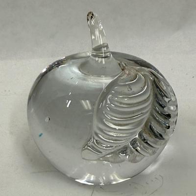 Sale Photo Thumbnail #380: Beautiful clear glass apple paperweight.  Great condition, measures approx. 3" tall to the top of the stem.