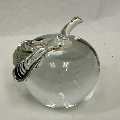 Sale Photo Thumbnail #379: Beautiful clear glass apple paperweight.  Great condition, measures approx. 3" tall to the top of the stem.