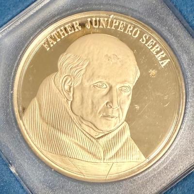Sale Photo Thumbnail #387: SOLID STERLING SILVER medal, it comes in a preservation capsule. Minted by The Franklin Mint in 1976, Commemorating Father Junipero Serra and the 200th anniversary of San Juan Capistrano Mission (1776-1976). It measures 1.5 inches (39mm) and weighs 22 GRA