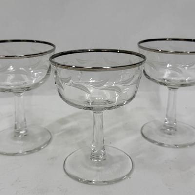 Sale Photo Thumbnail #397: Set of 3, frosted etched leaves around the body of the glass. Good condition, approx. 4.5” tall
