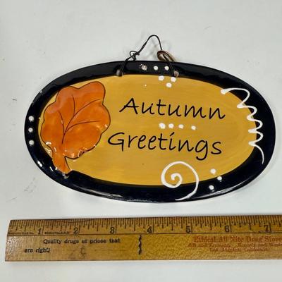 Sale Photo Thumbnail #157: Sign and pumpkin are ceramic, cat is a stiff chenille-like material.  All in good condition.