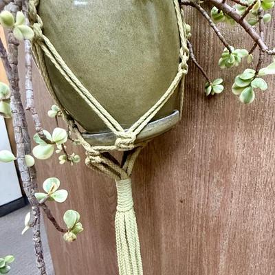 Sale Photo Thumbnail #131: Green macramé material and wood beads. In good condition.
