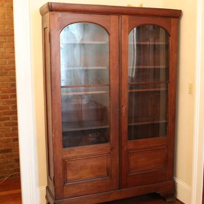 Antique Glass-Front Cabinet with Arched Doors