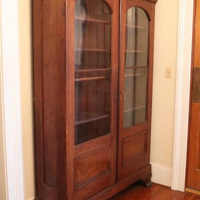 Antique Glass-Front Cabinet with Arched Doors