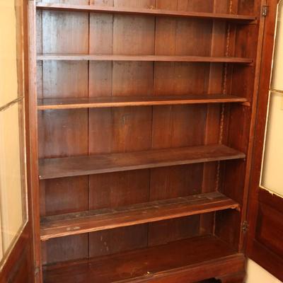 Antique Glass-Front Cabinet with Arched Doors