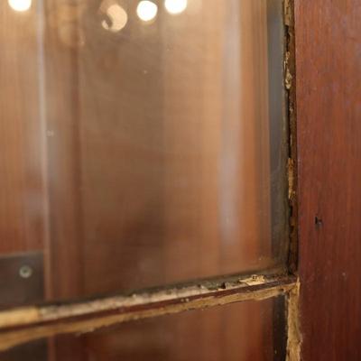 Antique Glass-Front Cabinet with Arched Doors