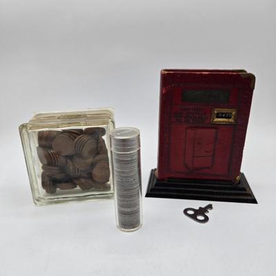 LOT 32: Glass Bank Filled with Wheat Pennies, Cylinder Filled with Steel Pennies and Zell Products Corp. Book Bank with Key Filled with...