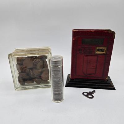 LOT 32: Glass Bank Filled with Wheat Pennies, Cylinder Filled with Steel Pennies and Zell Products Corp. Book Bank with Key Filled with...