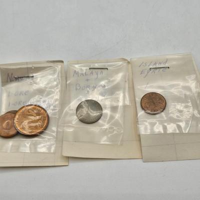 LOT 34: International Currency Collection - Coins and Paper Money Many Different Countries