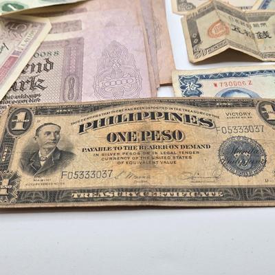 LOT 34: International Currency Collection - Coins and Paper Money Many Different Countries