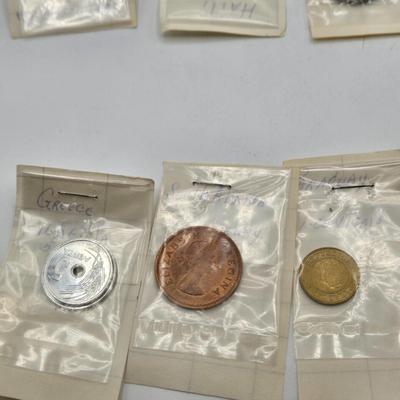LOT 34: International Currency Collection - Coins and Paper Money Many Different Countries
