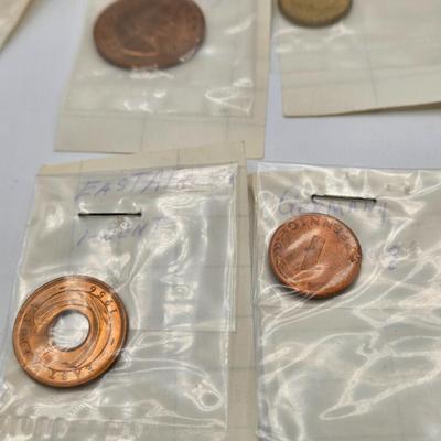 LOT 34: International Currency Collection - Coins and Paper Money Many Different Countries