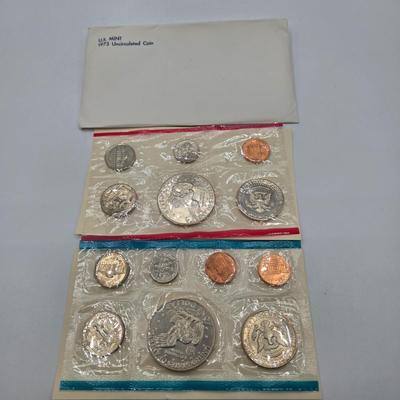 LOT 38: U.S. Mint Uncirculated Coins Sets from 1969, 1970, & 1973 and Special Mint Set 1965