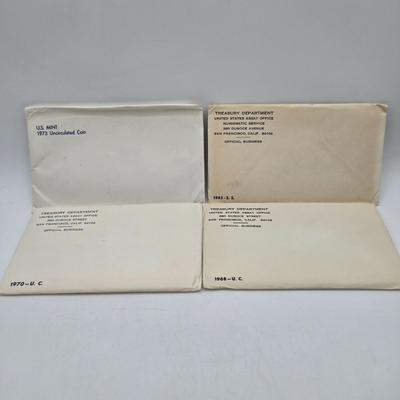 LOT 39: U.S. Mint Uncirculated Coin Sets from 1968 (in Sealed Envelope) , 1970, & 1973 and Special Mint Set from 1965