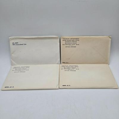 LOT 39: U.S. Mint Uncirculated Coin Sets from 1968 (in Sealed Envelope) , 1970, & 1973 and Special Mint Set from 1965