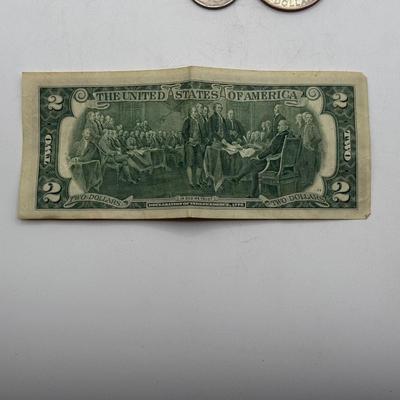 LOT 56: Currency Collection: Susan B. Anthony 1979 Half Dollar, Three 2 Dollar Bills, Silver Certificates and More!