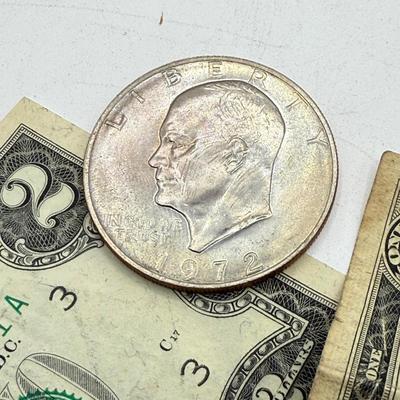 LOT 56: Currency Collection: Susan B. Anthony 1979 Half Dollar, Three 2 Dollar Bills, Silver Certificates and More!