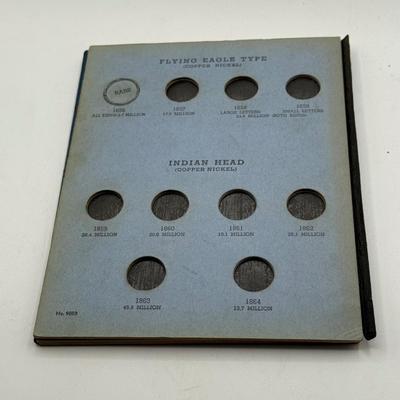 LOT 57: Collection of Empty Coin Booklets and Coin Collecting Guide Books
