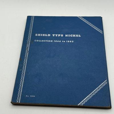 LOT 57: Collection of Empty Coin Booklets and Coin Collecting Guide Books