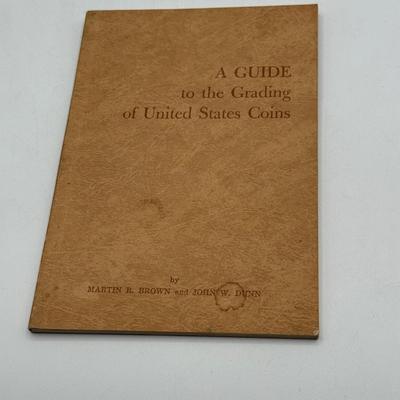 LOT 57: Collection of Empty Coin Booklets and Coin Collecting Guide Books