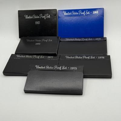 LOT 58: Collection of U.S. Proof Sets (1975, 1976, 1977, 1979, 1981, 1982, 1983)