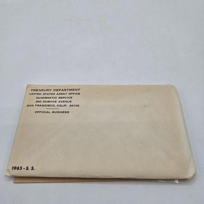 LOT 124: U.S. Mint Uncirculated Coin Sets from 1969, 1971, 1973, 1975, and Special Mint Set from 1965