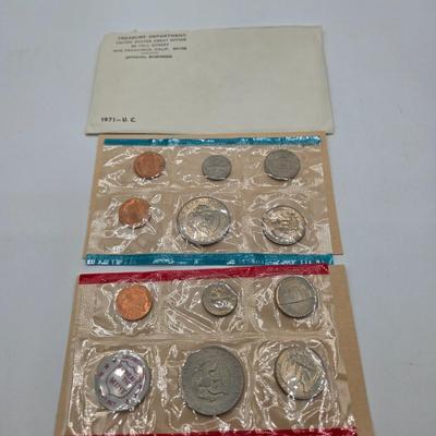LOT 124: U.S. Mint Uncirculated Coin Sets from 1969, 1971, 1973, 1975, and Special Mint Set from 1965