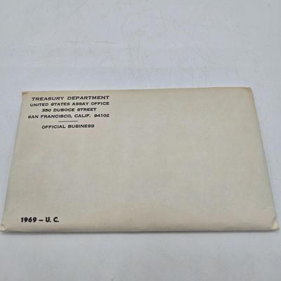 LOT 124: U.S. Mint Uncirculated Coin Sets from 1969, 1971, 1973, 1975, and Special Mint Set from 1965
