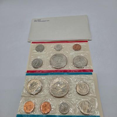 LOT 124: U.S. Mint Uncirculated Coin Sets from 1969, 1971, 1973, 1975, and Special Mint Set from 1965