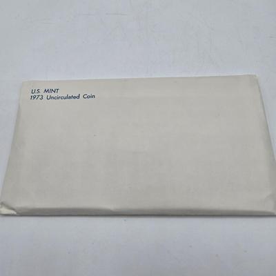 LOT 124: U.S. Mint Uncirculated Coin Sets from 1969, 1971, 1973, 1975, and Special Mint Set from 1965