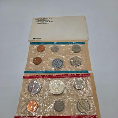 LOT 124: U.S. Mint Uncirculated Coin Sets from 1969, 1971, 1973, 1975, and Special Mint Set from 1965