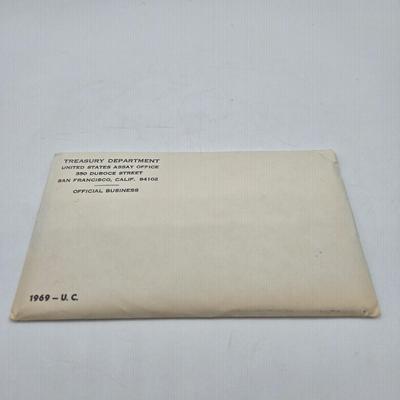 LOT 126: U.S. Mint Uncirculated Coin Sets from 1969, 1971 (in Sealed Envelope), 1973, & 1975, and Special Mint Set from 1965