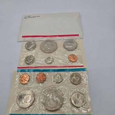 LOT 126: U.S. Mint Uncirculated Coin Sets from 1969, 1971 (in Sealed Envelope), 1973, & 1975, and Special Mint Set from 1965