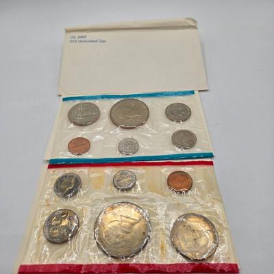 LOT 126: U.S. Mint Uncirculated Coin Sets from 1969, 1971 (in Sealed Envelope), 1973, & 1975, and Special Mint Set from 1965