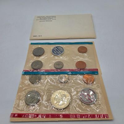 LOT 126: U.S. Mint Uncirculated Coin Sets from 1969, 1971 (in Sealed Envelope), 1973, & 1975, and Special Mint Set from 1965