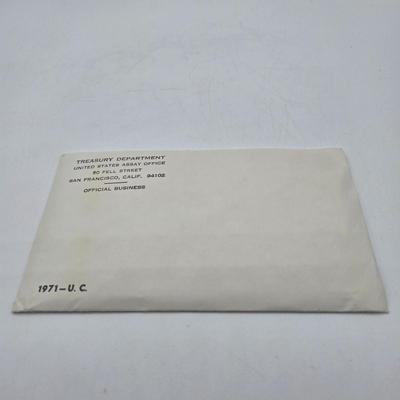 LOT 126: U.S. Mint Uncirculated Coin Sets from 1969, 1971 (in Sealed Envelope), 1973, & 1975, and Special Mint Set from 1965