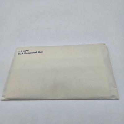 LOT 126: U.S. Mint Uncirculated Coin Sets from 1969, 1971 (in Sealed Envelope), 1973, & 1975, and Special Mint Set from 1965
