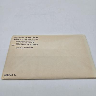 LOT 126: U.S. Mint Uncirculated Coin Sets from 1969, 1971 (in Sealed Envelope), 1973, & 1975, and Special Mint Set from 1965