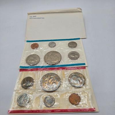 LOT 126: U.S. Mint Uncirculated Coin Sets from 1969, 1971 (in Sealed Envelope), 1973, & 1975, and Special Mint Set from 1965