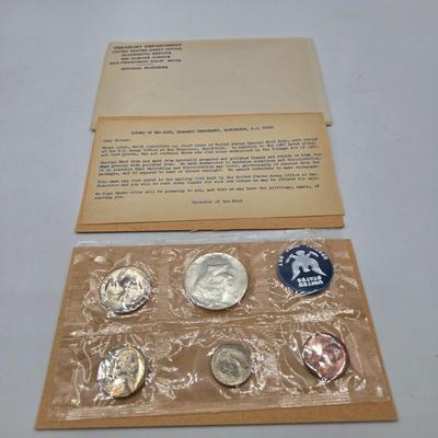 LOT 126: U.S. Mint Uncirculated Coin Sets from 1969, 1971 (in Sealed Envelope), 1973, & 1975, and Special Mint Set from 1965