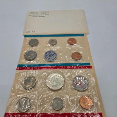 LOT 126: U.S. Mint Uncirculated Coin Sets from 1969, 1971 (in Sealed Envelope), 1973, & 1975, and Special Mint Set from 1965