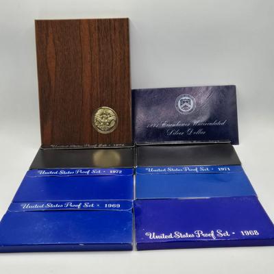 LOT 131: 1971 Eisenhower Proof Dollar, 1968, 1969, 1971, 1972, 1973, & 1974 Proof Set, and 1971 Uncirculated 40% Silver Eisenhower...