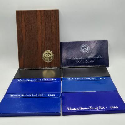 LOT 131: 1971 Eisenhower Proof Dollar, 1968, 1969, 1971, 1972, 1973, & 1974 Proof Set, and 1971 Uncirculated 40% Silver Eisenhower...